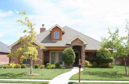 $205,000
GORGEOUS CUSTOM BUILT HOME! Four BR + Office, Large Open Living Area