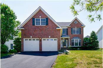 $469,000
Something to Brag About! Dominion Valley Brick Front Beauty!