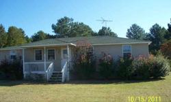 Fantastic price and a fantastic house in desirable Camden County. Enjoy country living in this 3 bedroom 2 full bath home on a great lot of almost a full acre. Large deck to enjoy the outdoors. Cute home sits back off of the main road with a dirt