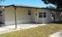 2BR, 1.5 bath mobile home in awesome Adult Park (over 50), Tampa, FL. Attached screened porch, plus Florida room and covered parking, updated carpet and appliances, close to shopping, airport, beaches, located in a beautiful part of Tampa - Town-N-Country