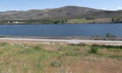 Affordable 2.5 ac. Vacation Retreat! Sunshine over 300 days a year. Views of the Columbia River, Mountains & Orchards for miles. Recreation Galore. Fish Salmon & Steelhead. The Okanogan & Methow Rivers Very Close by. Game Hunting. Boating, Skiing, Jet Ski
