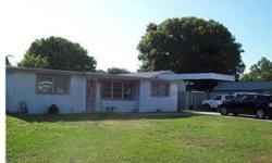 "Give me land, lots of land, don't fence me in." Actually this large 1.5 lot is fenced. You have a very large property in the heart of Pinellas county. On this property is a 3 bedroom, 2 bath home with a detached garage. The garage has been converted into
