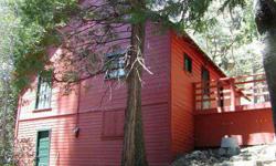 Nestled in a forest of trees you will find this 3 bedroom, 3/4 ba refurbished cabin in Alta Sierra. New metal panel roof, new paint inside & out, and new wood flooring through out. Parcel consists of two lots, one vacant. Both lots are part of mutual