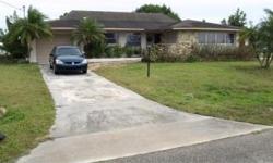 NOT A SHORT SALE !!! 3 Bedroom, 2 Bath, 1 car garage in desirable Country Club area of Cape Coral. Just two blocks from waterfront properties. Perfect home for first time buyers or as an Investment. Neutral Porcelain Tile & paint throughout, carpet in