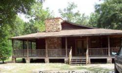 -Charming 2 bedroom 2 bath log home on over 2 acres of land. Home features a large kitchen, dining area,great room with stone fireplace, and wrap around porch. Needs new HVAC and vinyl floor in kitchen. FHA 203K financing suggested. $140,000.00 as is.