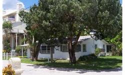 COMPLETELY REMODELED 2 BEDROOM PLUS OFFICE/DEN,1 BATH, 1 CAR GARAGE LOCATED ON A DOUBLE LOT WITH QUICK ACCESS TO THE GULF. NEW PAINT INSIDE AND OUT, NEW DIAGONAL CERAMIC TILE, NEW APPLIANCES,UPGRADED ELECTRICAL,NEWER CABINETS AND COUNTER TOPS, NEW C LOSET