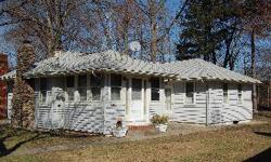 This home features three bedrooms, two full baths, and two car garage. Convenient to center of town, lake, and mass highways and train station. Home in need of work and renovating. Listing agent and office