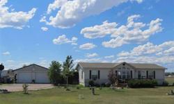 If you are looking for wide open spaces, this is the home for you!?? On 1 acre with views, this home features 3 bedrooms, 2 baths with a separate tub and shower in the master bath, open kitchen, dining, and living room design, wonderful 18x13 covered deck