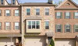 Absolutely gorgeous brick townhome in great location. Full finished basement with bedroom and full bathroom. Gleaming hardwood floors on main level. Bright, open and spacious kitchen with granite countertops. Two car garage. Oversized deck. Excellent
