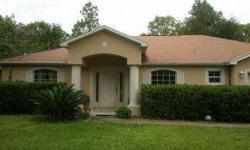 Beautiful 3 beds two bathrooms home with pool on large .80 acre lot.