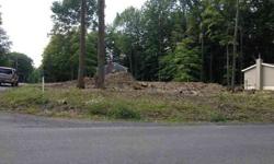 Fantastic building lot conveniently located on the corner of Green Lantern and Treasure Lake Road. This lot has already been surveyed,cleared, and excavated in preparation for a new home. Water,sewage,electric, and natural gas available.This building lot