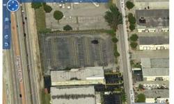 3 Large Paved and well lit surface parking lots --next to the Palmetto Expressway. Exposure--exposure. Lot has a guard house and is completely fenced and specifically set up for secure parking. Parking for over 300+ vehicles and has direct exposure to the