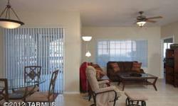 Recently remodeled condominium with Catalina Mountain views in the luxury community of La Reserve. This charming 3BR/2BA ground floor condo near clubhouse features ceramic tile flooring, high ceilings, split bedrooms, open kitchen, spacious great room,