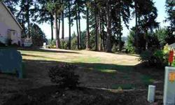 Gentle sloping lot, territorial views of Bayview Valley. Borders the 5th green and the 6th tee box of Useless Bay Golf & Country Club. Bright and sunny lot from sunrise to sunset. North, or rear of lot is surrounded by large fir trees, eagles, pheasants