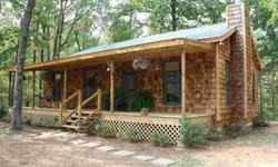 Welcome to Gatlinburg in Alabama! If you want privacy this is the house for you. This is a cedar shingle home with 3 bedrooms and 2 baths. The living room has a stacked stone fireplace, eat in kitchen, a covered front porch and an open back deck. The
