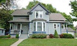 Perfect curb appeal for this pretty Victorian with a rocking chair front porch located on a quiet dead end street steps away from the bike path, the Fox River and downtown. Go back to a past where one had time to visit with neighbors on their front porch,