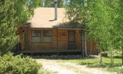 Cute, well loved cabin in great condition. Large deck with retractable awning is perfect for enjoying the outside. Ben Franklin wood stove heats up the house nicely (also electric baseboard). Two large bedrooms with great closet space. Bath has new