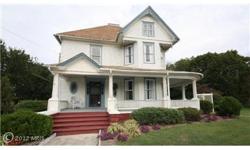 Update Victorian offers grand staircase as you enter.New chefs kitchen with commercial Vulcan stove, stainless steel frig. & more. 4 large bedroom 1 1/2 ba. Several outbuildings.Walk back in time with today's comforts.