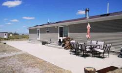 Awesome horse property at a great price! This spacious modular home features a great open floor plan, walk in closets in every bedroom, and a master bathroom fit for a king or queen! The five acres are fenced and the corral is perfect for all of your