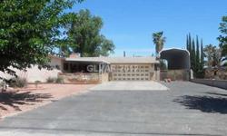 HUGE LOT-FRONT YARD WITH DESERT LANDSCAPING.PROPERTY HAS RV PARKING,2 STORAGE SHED,SURVEILLANCE CAMERA,SOLAR HEATED POOL..AND MANY MORE. CONTACT GILBERT at Nevada Real Estate Corporation