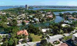 One of just a handful of vacant lots on the water in the Lido Beach area! Canal front undeveloped lot with no deed restrictions - 12,785 sq. ft. and 75 ft. of waterfront! The canal provides access to Sarasota Bay, as well as the sparkling azure waters of