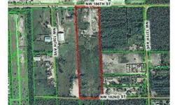 9.89 Acres centrally located right off Highway W27, Property is completely fenced in. County allows 1 SFH per 5 acres. This parcel is extensively filled. The ROZA zoning is very unusual; its designed for mining-related uses such as Limestone Quarrying,
