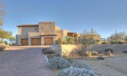 Situated on a acre and a quarter elevated lot with incredible views of the Troon north Pinnacle Golf Course. The 10th green is located behind this spacious custom home, lots of glass and multiple view decks. Spacious backyard and oversized pool and spa.
