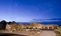 Come and experience the ultimate Scottsdale Lifestyle. Premium Golf Course Lot with Views and Pool/Spa Courtyard Patio enveloped with Boulder Outcroppings for privacy and fabulous entertaining. Great Room floor plan with Cozy Fireplace and Wood Beamed