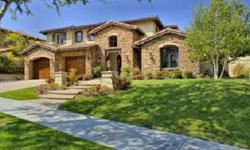 Magnificent custom home in the prestigious guard gated Westridge Estates of Valencia. The tuscan faade of this bespoke home exudes elegance. The exquisite gourmet kitchen boasts an oversized center island, butlers pantry and separate walk-in pantry, top