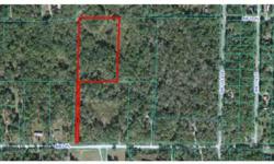 This is a 5.28 Acre Flag Lot with lots of trees. Mobil homes are allowed. Property is on a dirt road with a paved road a short distance away. Located Between Ocala and Dunnellon. Conveinent to both cities. This is not a Short Sale or a Foreclosure.Taxes