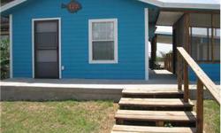 Home located on the Colorado River in Matagorda just minutes from offshore Gulf of Mexico and Matagorda Bay fishing. Come and enjoy the beach fun with friends and family! Fishing pier with fish cleaning table. This home has wheelchair accessibility. Two