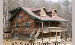 Fantastic Coventry Log Home!Have you been looking for the "right" log home? If so your search is over!! This fantastic Fairfield Model Coventry Log Home is simply gorgeous. Set on a great wooded 2.6 acre lot complete with walking trails and a beautiful