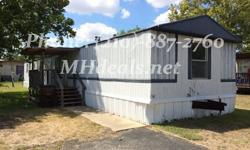 An extremely cheap single wide home in great condition. Comes with 3 bedrooms and 2 bathrooms. This home is a good size 1,216 square feet (16 x 76). Kitchen has a long storage island wall, with available supplies. In master bathroom you will get a corner
