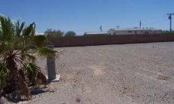 Ideal lot for your RV or Park Model. Property is centrally located, just walking distance to grocery stores, dining, post office and many other Quartzsite's activities. City water and sewer, and 200 amp power service.Listing originally posted at http