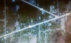 2.1 ACRES COMMERCIAL LOT SIZE APPROX 165' x 575' BROKERS PROTECTED