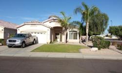 STANDARD SALE AND SELLER WILL CARRY PROPERTY. This beautiful 3 bedroom plus Den home is located in a great area of Gilbert close to shopping and entertainment. When you walk into the home it opens into a large formal living room and dining room with a
