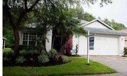 Westchase Beauty at a beautiful price...$245,000 for a 4 bedroom/2 bath home with fenced yard, conservation lot offers privacy and serenity. WOOD floors, newer kitchen appliances and BRAND NEW AC (just installed May 15th, 2012!) beckons those seeking a "m