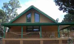 Fantastic cabin at a terrific price! This three bedrooms/two bathrooms log sided cabin has something for everyone with high ceiling, dual pane windows & corian counters, a enormous 3 car garage w/rv bay & workshop, guest quarters for in-laws or teen &