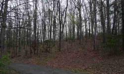 $24,900. Wooded lot. Excellent building site presented by roger d. Listing originally posted at http