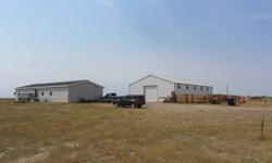 You gotta see this! Panoramic views, a beautiful home, and a 64x40 shop all on 20 acres. Dirt bike track on property.Listing originally posted at http