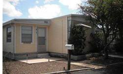 Large (total 1,810 sq.ft.) 2 bedrooms, 1 bath ready to move in as furniture is included. Livingroom/diningroom combo with adjoining Florida room, plus den/office or 3rd bedroom, large bathroom, screened workshop with washer/dryer, 2 large utility sheds, c