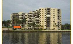 Completely updated direct Intracoastal waterfront condo with new appliances, granite, impact windows, designer window treatments. Sellers added the windows, a/c and window treatments since purchasing.Two large split plan master suites in this amazing