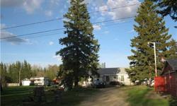 Absolutely one of a kind property located on 1.36 acres right in the centre of town. This parcel has been in the family since the beginning of time and at one time had a 5 lot subdivision drawn up for it. Located in the Village of Alberta Beach, off the