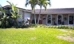 Extremely desirable family oriented neighborhood, Beautifully Remodeled home, move in ready, Large screened in patio overlooking pool, professionally landscaped yard. Please confirm school boundaries at broward schools dot com THIS LISTING COURTESY OF