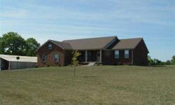 Spacious custom built ranch with full unfinished basement on 5.76 acres! Abundant wildlife and peaceful setting! The home features a split bedroom plan with hardwood and tile flooring in the common areas. The great room has a cozy gas log fireplace and