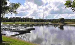 LOCATION AND VIEW...No detail has been overlooked in this beautiful Quarry condo -- overlooking a large lake this first floor unit has it all. From the gourmet kitchen that features granite counters, stainless steel appliance, custom lighting to the