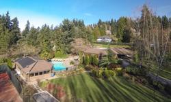 Every day is vacation at this 1.23 acre estate complete with pool, tennis court, multilevel deck & cabana/guest house with full kitchen, sauna, steam room, vaulted great room & covered patio with built-in BBQ . This gorgeous, sprawling rambler was