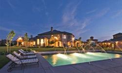 Poised on a 5.61 acre, Robert Boros' landscaped parcel is one of custom home builder, Ed Cantania's, finest homes. Inside find 7000sf of high quality construction and finish work, featuring an in-home theater, large office, two laundry rooms, game room,