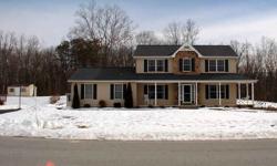 BEAUTIFUL STONE FRONT COLONIAL LOCATED ON A 1/2 ACRE LOT BACKING TO WOODS* FEATURING 4 BR'S,2 1/2 BATHS,FULL BASEMENT W/ ROUGH IN,2 CAR SIDE LOAD GARAGE,FRONT PORCH,& EXTRA LARGE DRIVEWAY*ENJOY THE SPACIOUS MASTER SUITE FEATURING VAULTED CEILINGS & FULL