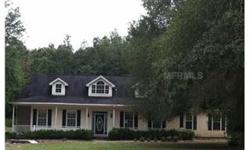 3 lightly wooded acres surround this 3 bedroom home Built in 2002 and has over 2000 square feet of living room. This lovely home features a large family room with wood burning fireplace, formal dining room, vaulted ceilings and a kitchen with large center